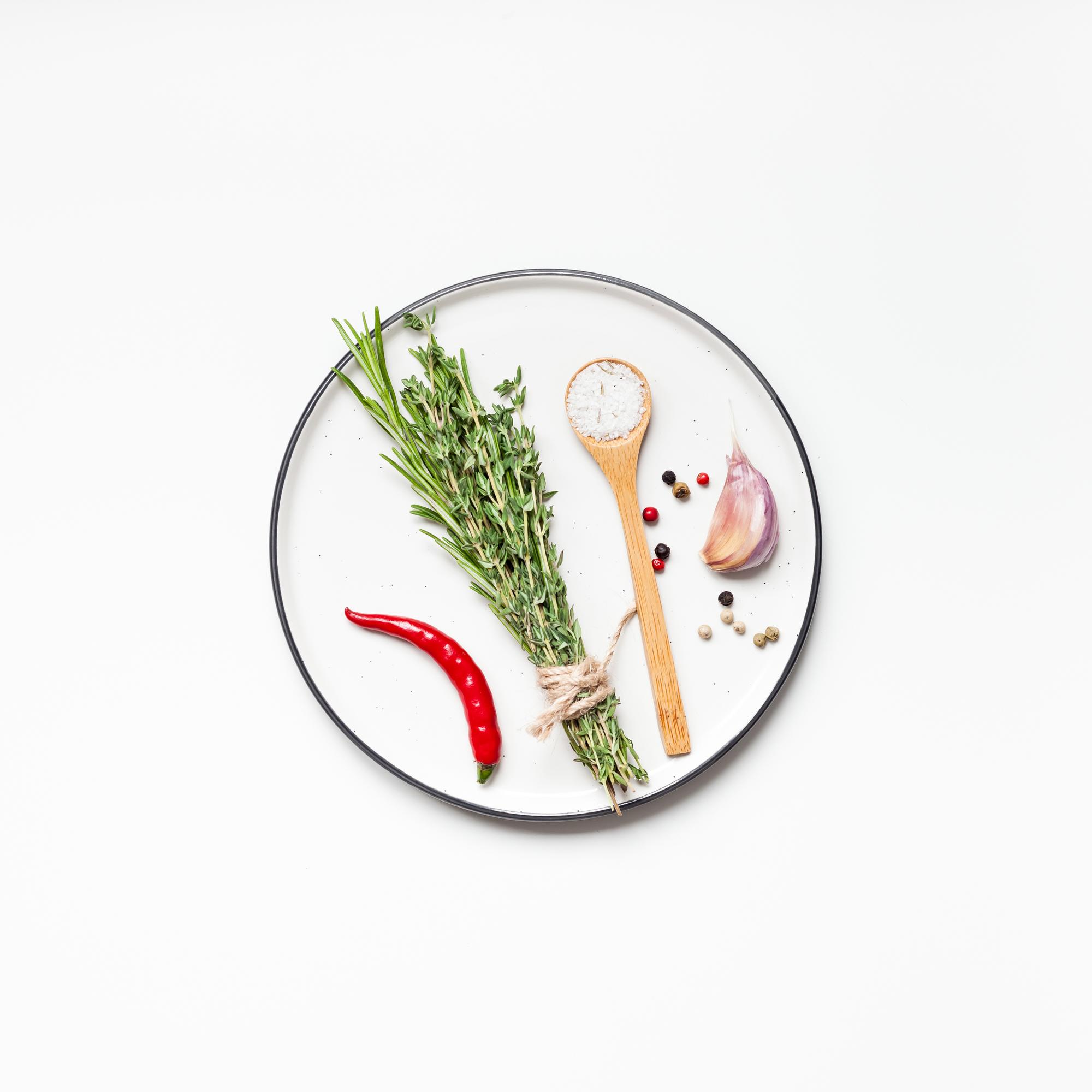Set of culinary tools and plated dish
